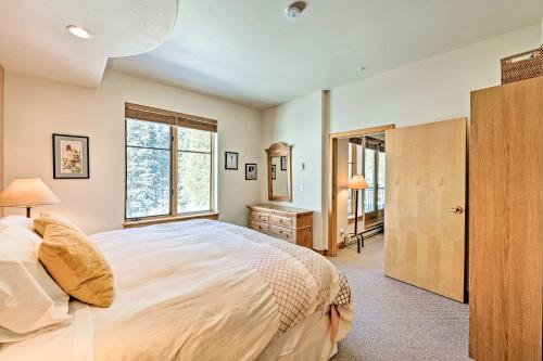 a bedroom with a bed and a desk and a window at Solitude Creekside Condo-Closest to Ski Lift! in Solitude