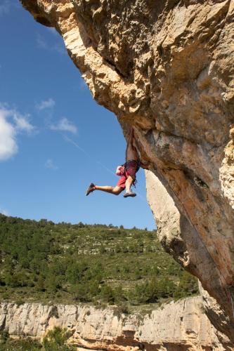 a person is rappelling off of a cliff at Hostal Rural Fidel Garcia Guzman in Chera