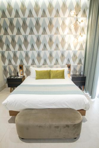 Becquer Hotel Guadalajaraにあるベッド