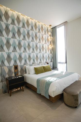 Becquer Hotel Guadalajaraにあるベッド