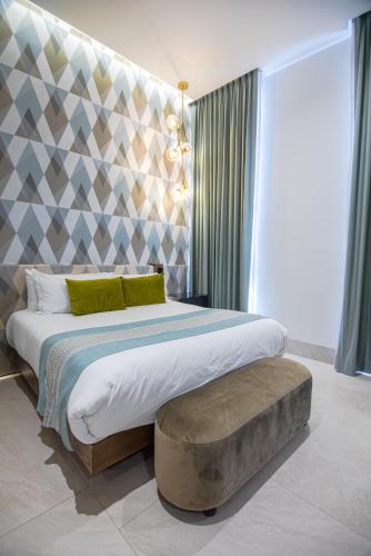 Becquer Hotel Guadalajaraにあるベッド