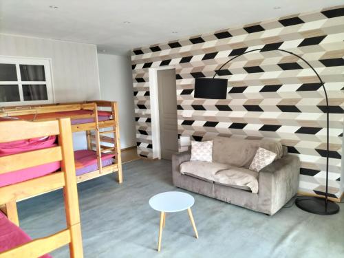 Postel nebo postele na pokoji v ubytování les JARDINS de PRATAVONE