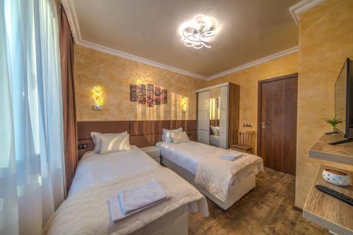 Postel nebo postele na pokoji v ubytování Forest Home 524