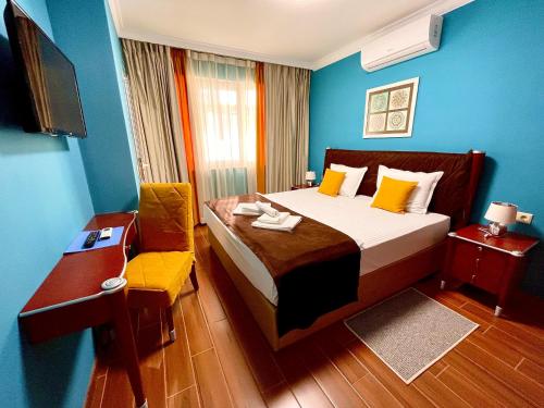 Ένα ή περισσότερα κρεβάτια σε δωμάτιο στο Art Green Boutique Hotel