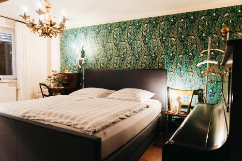 Ένα ή περισσότερα κρεβάτια σε δωμάτιο στο Tante Berg B&B