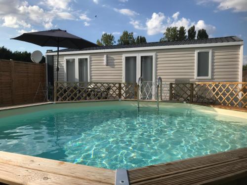 Πισίνα στο ή κοντά στο Résidence de vacances Villa Cottage