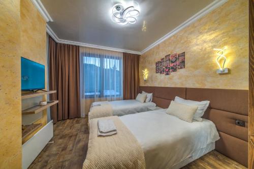 Postel nebo postele na pokoji v ubytování Forest Home 524