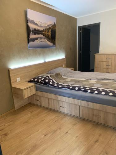 Ένα ή περισσότερα κρεβάτια σε δωμάτιο στο Appartement le Saint Simond