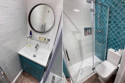 a bathroom with a sink and a shower and a toilet at Cosy 2 bedroom cottage in Scarborough's Old Town in Scarborough