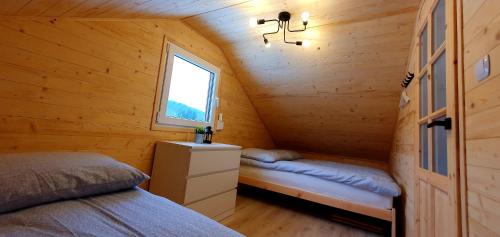 En eller flere senge i et værelse på Magurski Domek Nad Potokiem