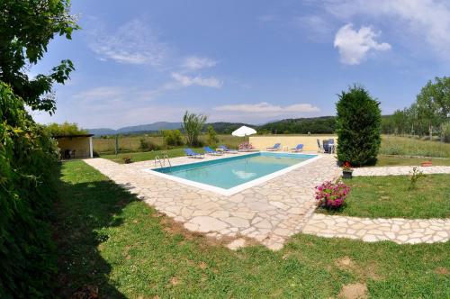 an image of a swimming pool in a yard at Corfu Villa Ermioli with Pool in Giannádes