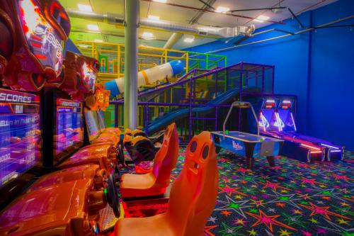 a row of arcade games in a room at Moon Palace The Grand Cancun All Inclusive in Cancún
