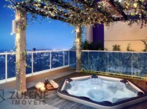 a bathroom with a jacuzzi tub on a balcony at ACONCHEGO E BEM ESTAR in Brasilia