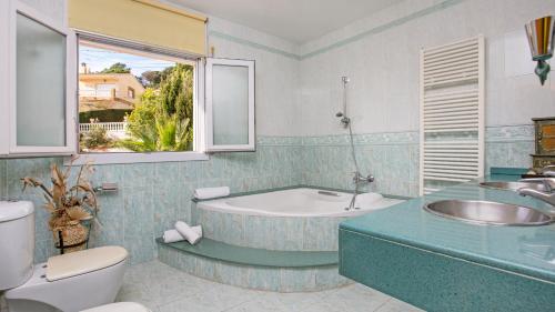 Kúpeľňa v ubytovaní 2 Garb - Lloret de Mar