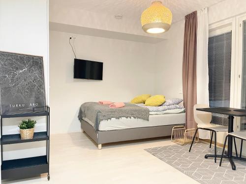 Postel nebo postele na pokoji v ubytování Haalia Homes Turku Pääskynpesä