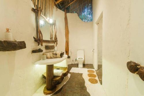 a bathroom with a sink and a toilet at Ella Retreat Hotel Villa for Nature Lovers in Ella