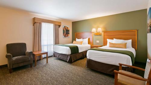 Postel nebo postele na pokoji v ubytování Best Western Graham's