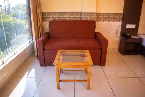 Гостиная зона в MVT Guesthouse & Restaurant (Rishikesh)