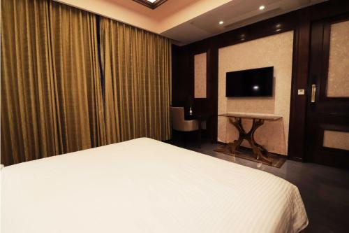TV/Unterhaltungsangebot in der Unterkunft Seven Eleven Hotels and Club