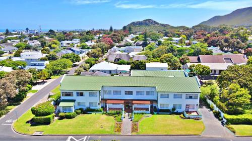 an aerial view of a house in a residential neighborhood at Fairway Holiday Accommodation in Hermanus