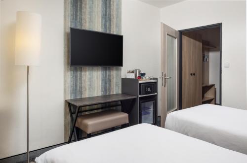 Postel nebo postele na pokoji v ubytování OREA Resort Devět Skal Vysočina