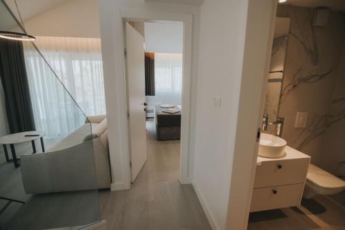 Kúpeľňa v ubytovaní Malo More Resort