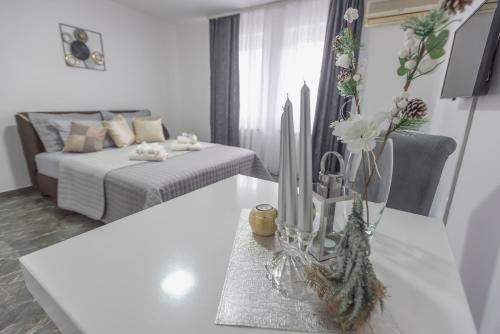 Ένα ή περισσότερα κρεβάτια σε δωμάτιο στο Apartman Milion Banja Koviljača