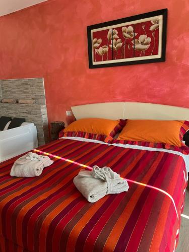 Ένα ή περισσότερα κρεβάτια σε δωμάτιο στο Agriturismo Monteroseo