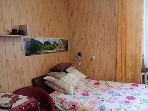 Postel nebo postele na pokoji v ubytování Pokoje u Adama i Ewy