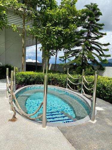 a small swimming pool with a rope around it at 2 Bedroom Apartment (Windmill Upon Hills, Genting Highlands) in Genting Highlands