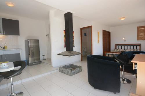 Kuchyň nebo kuchyňský kout v ubytování Aina Hôtel