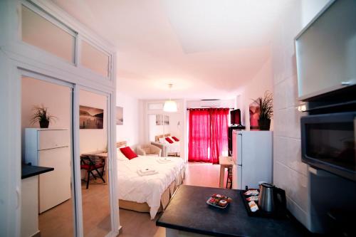 Postel nebo postele na pokoji v ubytování Apartamentos DC II