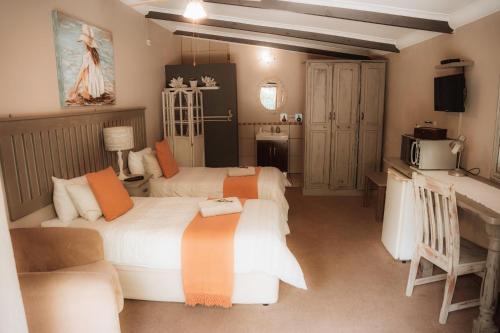 Ένα ή περισσότερα κρεβάτια σε δωμάτιο στο L'anda Guesthouse & self catering