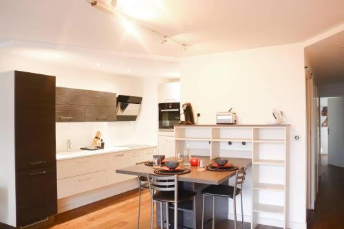 Køkken eller tekøkken på T3 au centre ville avec balcon, parking gratuit