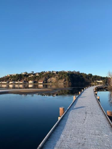 a bridge over a body of water at experience a fantastic summer house 2025 in Kristiansand