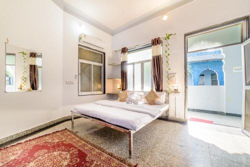 Postel nebo postele na pokoji v ubytování Hide-In Pushkar