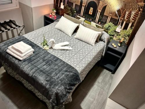 Ліжко або ліжка в номері Hostal Paco´s