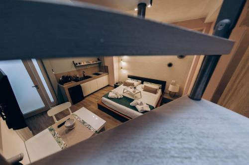 an overhead view of a small room with a bed and a room at Liconti Exclusive Rooms in Pulsano
