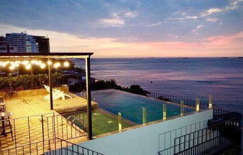 a view of a swimming pool on top of a building at Fati Boutique Hotel & Apartment in Vung Tau