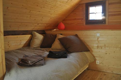 Ένα ή περισσότερα κρεβάτια σε δωμάτιο στο Eco Gite La Grange
