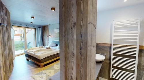 A bed or beds in a room at Appartement Hauser