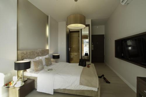Μια τηλεόραση ή/και κέντρο ψυχαγωγίας στο Platinum Residence