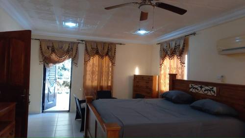 Postel nebo postele na pokoji v ubytování Gam Properties Guest House