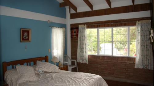 Postel nebo postele na pokoji v ubytování Finca El Ensueño