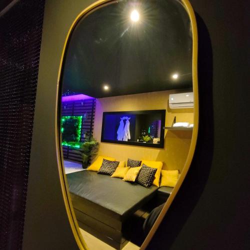 Χώρος καθιστικού στο La Gaillardise - love room - Spa & Sauna - Espace privatif
