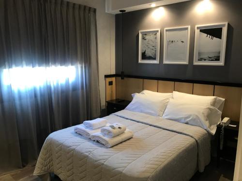Postel nebo postele na pokoji v ubytování Posada Güemes BOUTIQUE