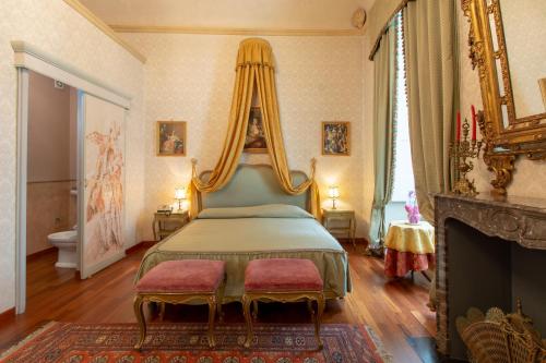 Säng eller sängar i ett rum på Hotel Antica Dogana