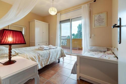 Säng eller sängar i ett rum på Casa Xixella a 15 min de Sitges