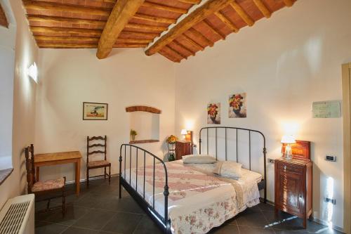 En eller flere senge i et værelse på Colle da Vinci