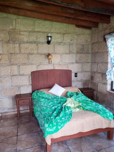 Cama o camas de una habitación en Casa en Cuernavaca con lavadero